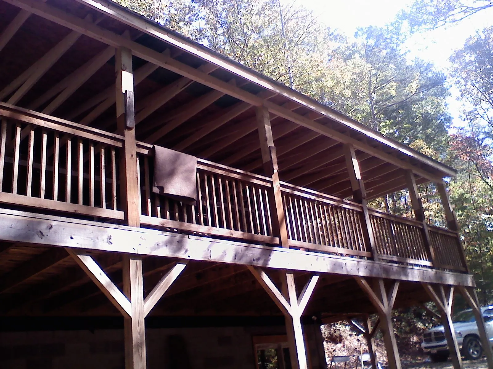 Timber framing under a new elevated porch and deck — Roof Leak Repair in Winterville by Roofing Brothers